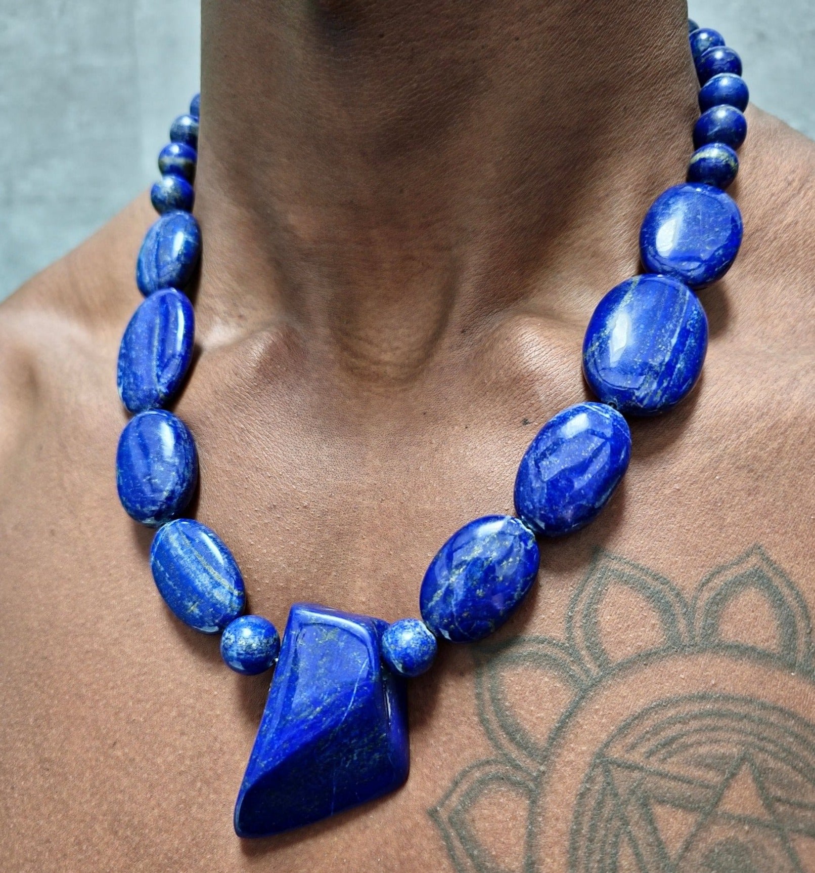Jitu: Lapis Spheres, Lapis Pendant worn